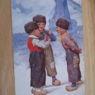 Postcard - Dutch Children smoking pipes by a windmill "H Feiertag" 1912 posted